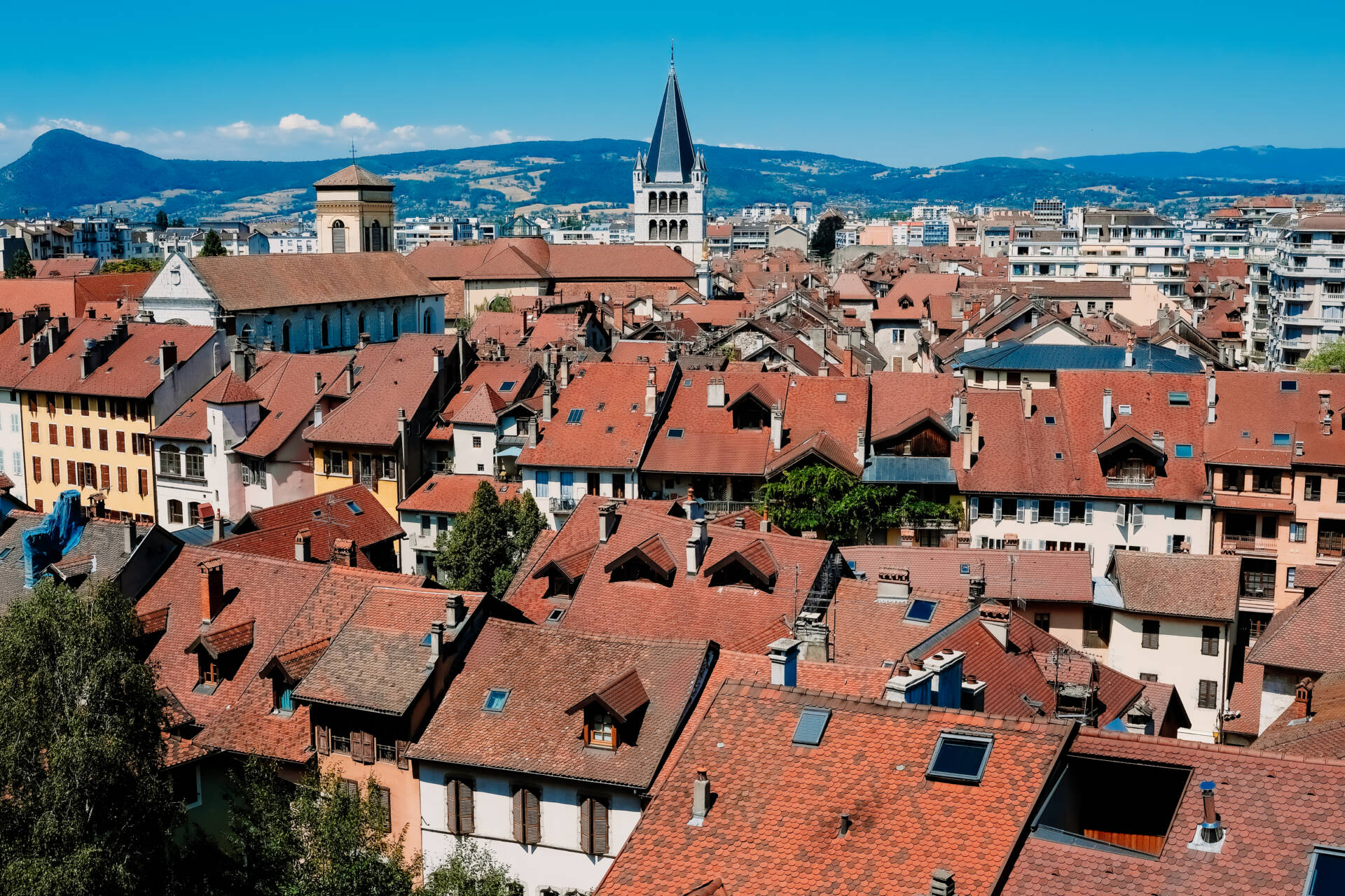 Views from above of the French city of Annecy on a sunny Sunday